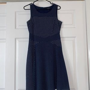 Limited size 4 dress. Blue with white polka dots.
